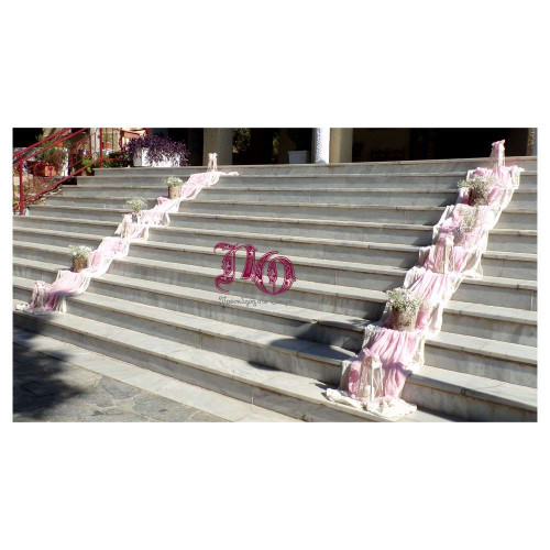 Στολισμός γαμοβάπτισης λουλούδια-κουκουβάγιες