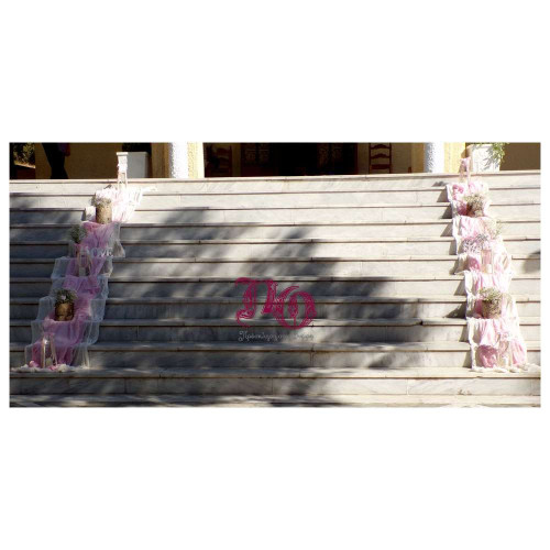 Στολισμός γαμοβάπτισης λουλούδια-κουκουβάγιες